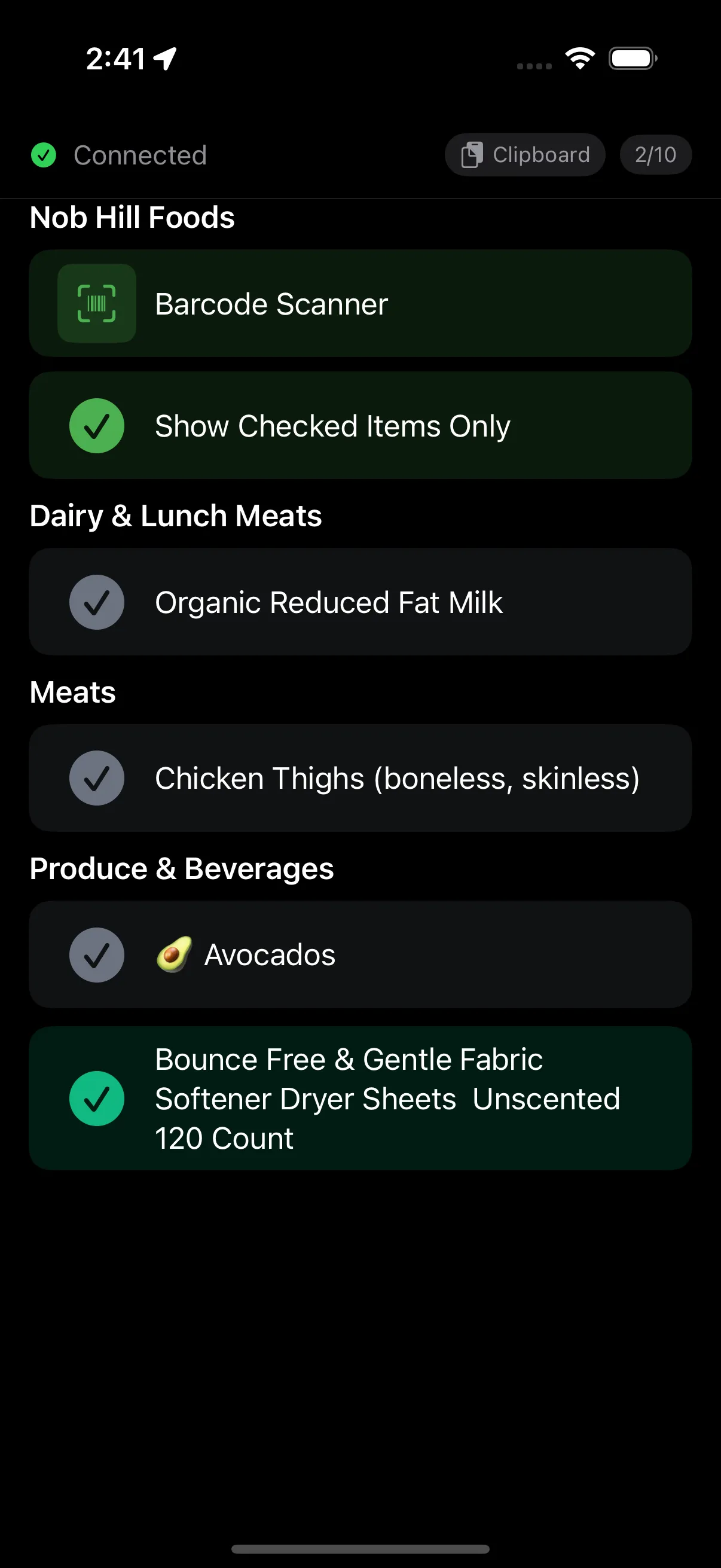 PromptDeck grocery list page showing Barcode Scanner button, grouped items with checkmarks, and toggle list layout