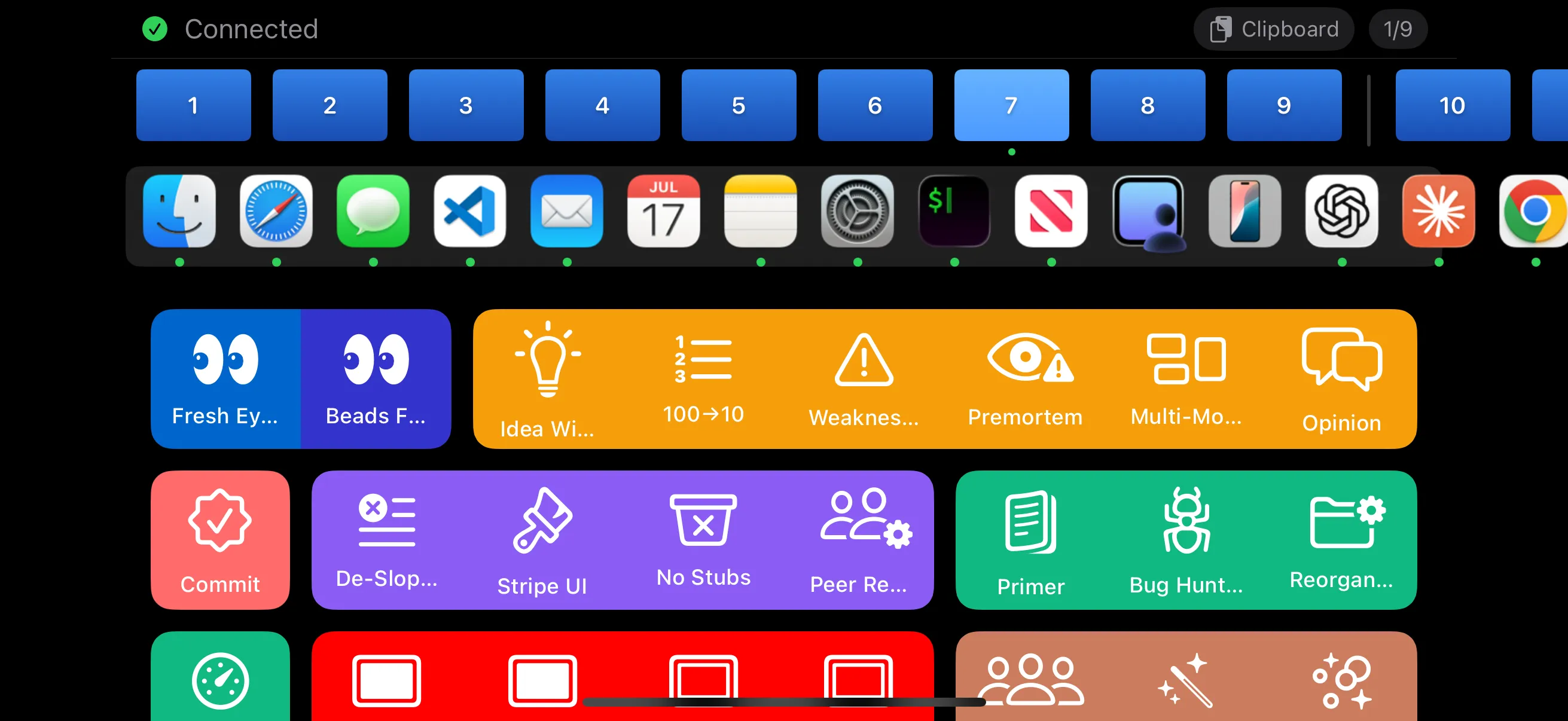 PromptDeck in landscape showing a full grid of colorful coding buttons, Space indicators, and page navigation